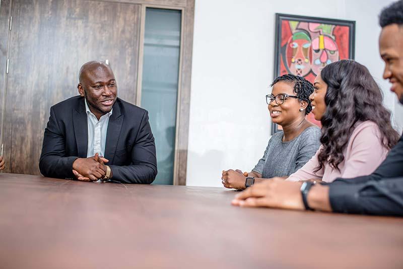 Dr. Abasi Ene-Obong interacting with the team.