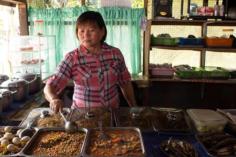 A client of Banko, Ms. Joan Laguardia at her business.