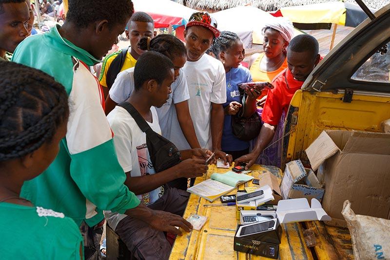 A man sells mobile phones in Madagascar.