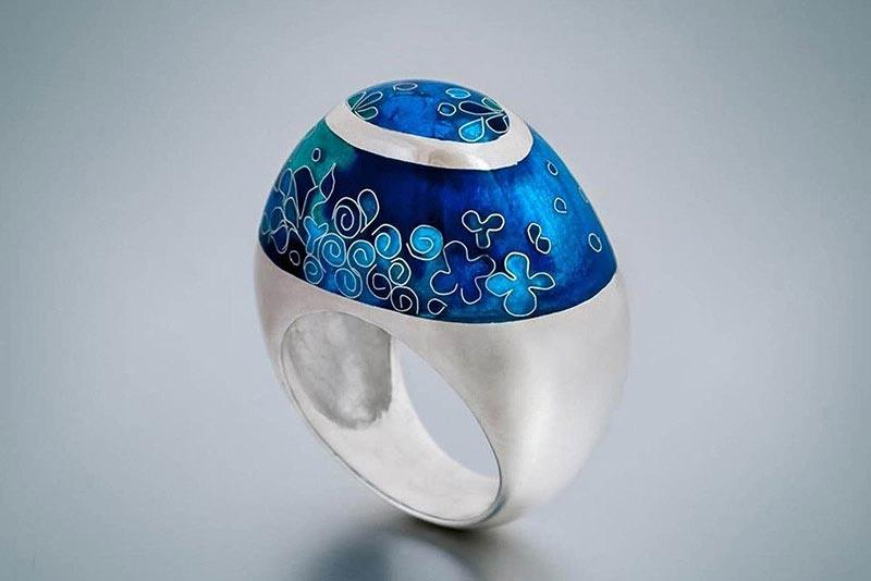 An enamel silver ring.