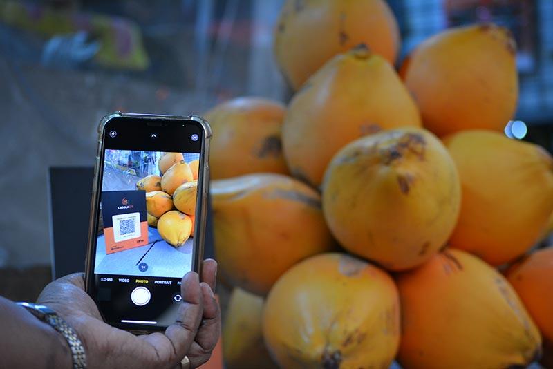 The LANKAQR code, a national Quick Response (QR) code, displayed at the store facilitating fast, secure and low-cost digital payments.