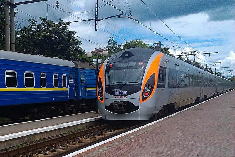 Passenger trains in Truskavets, a resort town in western Ukraine. The new passenger trains (right), produced by South Korea, were introduced in 2012.