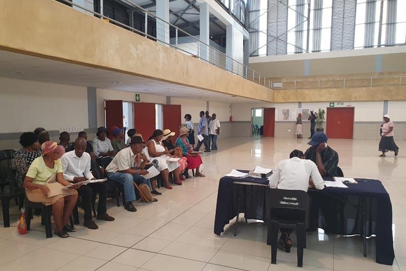 Some claimants showing up in Sundumbili Pilot A to process their title deeds.