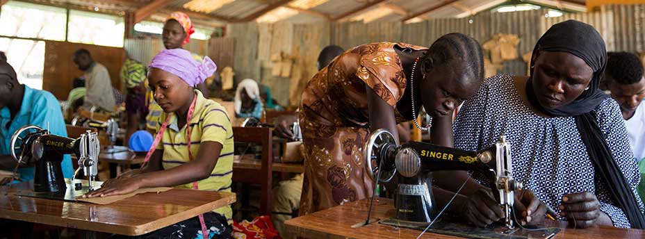 Refugees learn a new skill set as they take classes in the Tailoring Department at Don Bosco Technical Institute in Kakuma Refugee Camp, Kakuma Kenya on February 9, 2018. Photo © Dominic Chavez/International Finance Corporation      